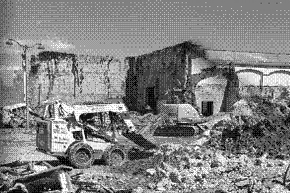 heavy machinery, piles of rocks and concrete, and half demolished building, pixelated thumbnail
