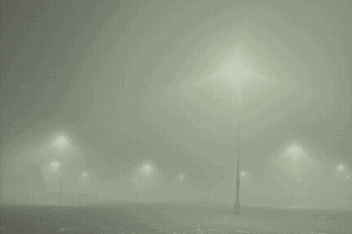 night time, lights in a parking lot, no cars, hazy atmosphere, pixelated thumbnail