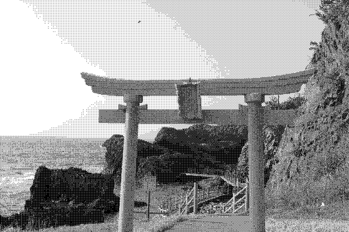 a tori gate, with an ocean view on the side of a cliff thumbnail